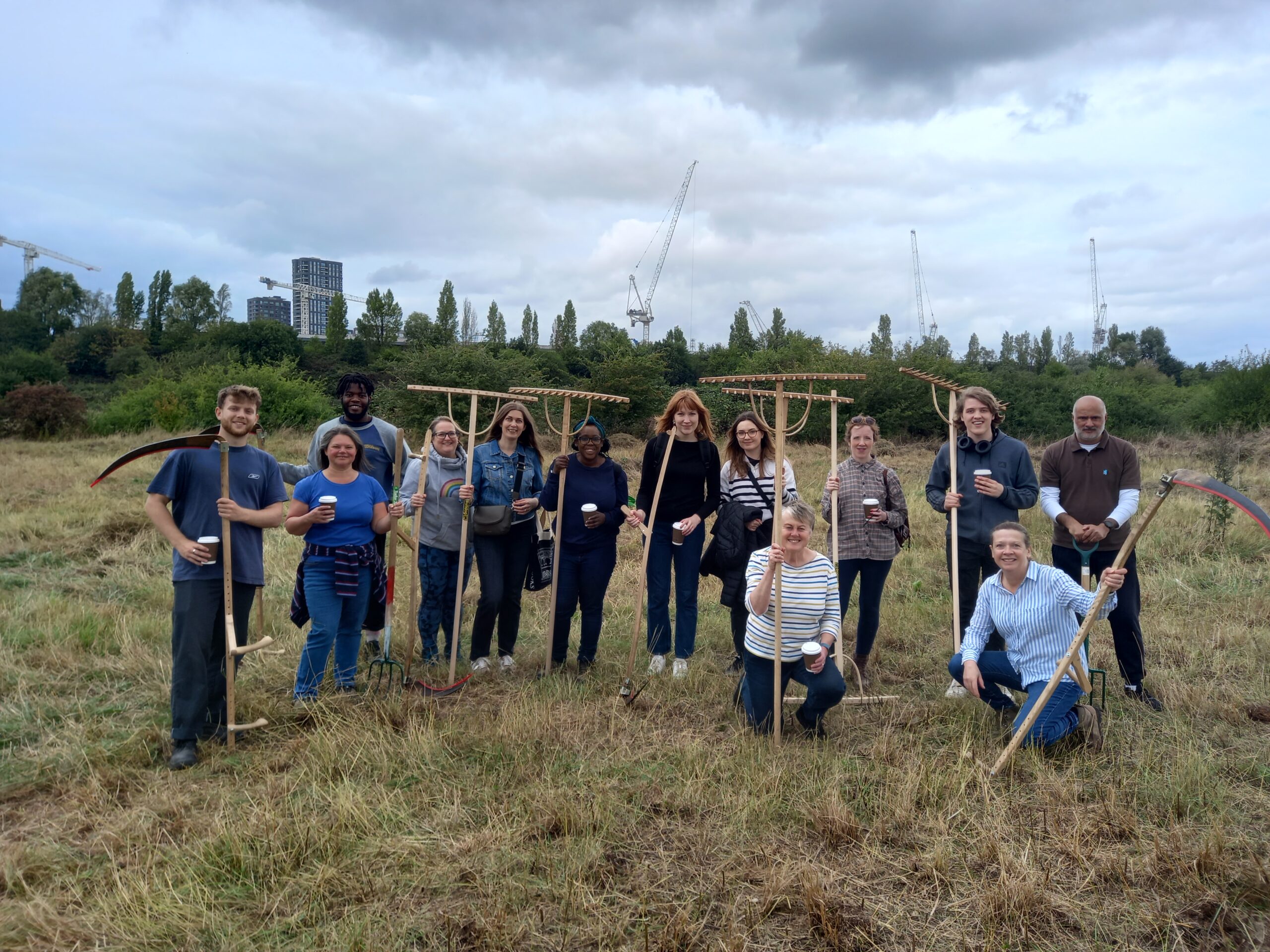 volunteers scything