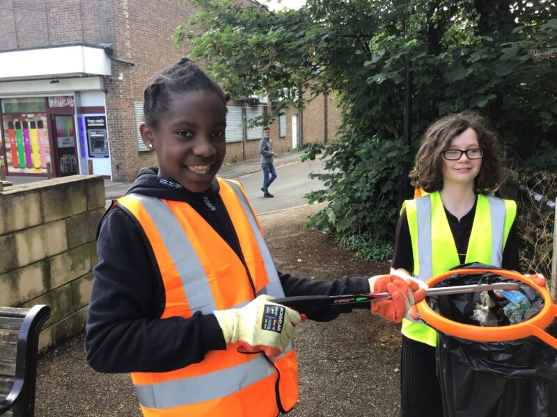 two students helping