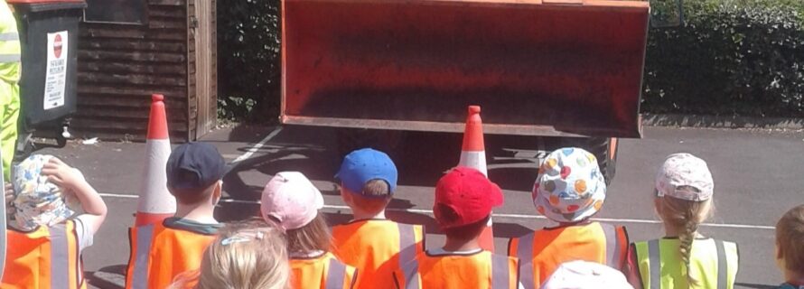 Children looking at tractor