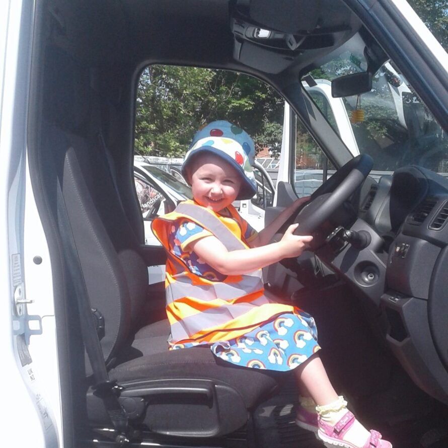 Happy child inside vehicle