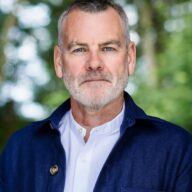 headshot of uk CEO Aidan Bell
