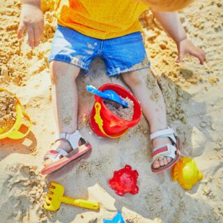 Adorable,Little,Girl,On,Playground,In,Sandpit.,Toddler,Playing,With
